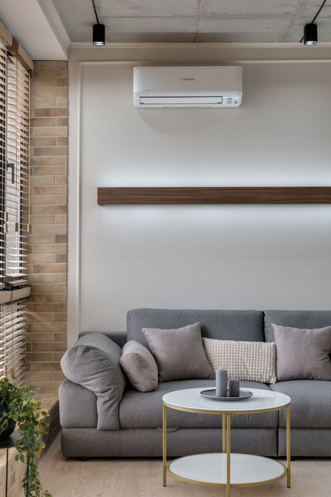 Salon confortable équipé d’une climatisation